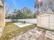 Spacious backyard with patio, shed, and trampoline at 1805 Jefferson Dr, Mount Dora, FL 32757