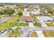 Aerial view showcases house and surrounding neighborhood at 21524 Queen Anne Ct, Leesburg, FL 34748