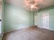 Bedroom featuring neutral walls, carpeted flooring, and a closet with a white door at 2209 Stonebridge Way, Clermont, FL 34711