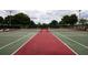 Overhead view of green and red pickleball courts showcasing nets and court lines at 2209 Stonebridge Way, Clermont, FL 34711