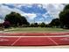 Shuffleboard court with lush surroundings and blue skies in the background at 2209 Stonebridge Way, Clermont, FL 34711