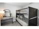 Bedroom with a bunk bed and a vanity at 2311 Sunset Way, Davenport, FL 33837