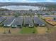 Aerial view of homes near a lake at 2597 Mariotta Rdg, Clermont, FL 34715