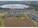 Aerial view of homes near a lake at 2597 Mariotta Rdg, Clermont, FL 34715