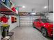 Garage with overhead storage and ample space for vehicle at 2597 Mariotta Rdg, Clermont, FL 34715