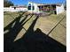 Backyard view showing a spacious grassy area and a shed at 2620 Janet St, Kissimmee, FL 34741