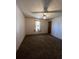 Bedroom with carpet, window, and ceiling fan at 2620 Janet St, Kissimmee, FL 34741