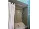 Shower stall with tiled walls and handheld shower head at 2620 Janet St, Kissimmee, FL 34741