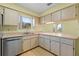 View of kitchen sink and dishwasher at 26548 Deuce Ct, Leesburg, FL 34748