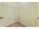 Large walk-in closet with wire shelving for storage at 26548 Deuce Ct, Leesburg, FL 34748