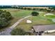 Aerial view of golf course with cart paths and sand traps at 26715 Manassas Dr, Leesburg, FL 34748