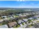 Aerial view of a residential neighborhood with houses and roads at 26912 Tanner St, Leesburg, FL 34748