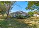 House exterior showcasing a well-maintained backyard at 26912 Tanner St, Leesburg, FL 34748