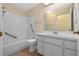 Clean bathroom with a tub, toilet and vanity at 26912 Tanner St, Leesburg, FL 34748