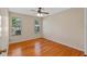 Spacious bedroom with wood floors and neutral walls at 26912 Tanner St, Leesburg, FL 34748