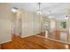 Bright dining room with hardwood floors and mirrored wall at 26912 Tanner St, Leesburg, FL 34748