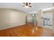 Bright living area with hardwood floors, kitchen and bathroom views at 26912 Tanner St, Leesburg, FL 34748