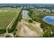 Aerial view of an RV park and surrounding landscape at 26913 Racquet Cir, Leesburg, FL 34748