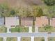 Aerial view of houses and neighborhood street at 26913 Racquet Cir, Leesburg, FL 34748