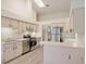 Beautiful kitchen featuring stainless steel appliances and modern countertops at 26913 Racquet Cir, Leesburg, FL 34748