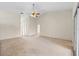 Spacious living room with high ceilings and carpet at 26913 Racquet Cir, Leesburg, FL 34748