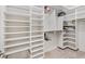 Large walk-in closet with ample shelving and hanging space at 2954 Silk Tree Ter, The Villages, FL 32163