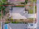 Top-down view of house, yard, and driveway at 30111 Pga Dr, Mount Plymouth, FL 32776