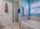 Spa-like bathroom with walk-in shower and garden tub at 30111 Pga Dr, Mount Plymouth, FL 32776