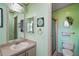 Light green bathroom with shower and single vanity at 3310 Manatee Rd, Tavares, FL 32778