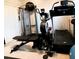 Well-equipped home gym featuring various exercise machines at 335 Grand Reserve Dr, Davenport, FL 33837