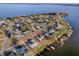 Aerial view of waterfront home with private dock and expansive lot at 33648 Picciola Dr, Fruitland Park, FL 34731