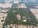 Aerial view of property showing house and surrounding land at 3493 Edwards Road, Lady Lake, FL 32159