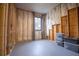 Unfinished basement room with a window and storage at 3493 Edwards Road, Lady Lake, FL 32159