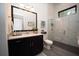 Elegant bathroom with marble shower and modern vanity at 3493 Edwards Road, Lady Lake, FL 32159