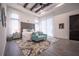 Main bedroom with plush carpet, a sitting area and plenty of natural light at 3493 Edwards Road, Lady Lake, FL 32159