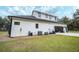 House exterior showcasing the garage and landscaping at 3493 Edwards Road, Lady Lake, FL 32159