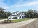 Modern two-story home with a large backyard at 3493 Edwards Road, Lady Lake, FL 32159