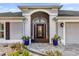 Elegant front entry with screened porch at 3545 Lia Ln, The Villages, FL 32163