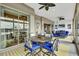 Sunroom with water views and access to outdoor entertaining space at 3545 Lia Ln, The Villages, FL 32163