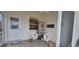 Cozy front porch with comfortable seating and decorative accents at 3621 Amelia Ave, The Villages, FL 32162