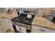 Kitchen features a stainless steel gas range and granite countertops for cooking at 3621 Amelia Ave, The Villages, FL 32162