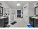 Large bathroom with double sinks, a garden tub, and a separate shower at 36341 Grand Island Oaks Cir, Grand Island, FL 32735