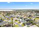 Aerial view showing home's location in a quiet residential neighborhood at 3962 Neighborly Way, The Villages, FL 32163