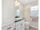 Small bathroom with single vanity and toilet at 3962 Neighborly Way, The Villages, FL 32163