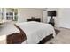 Bright bedroom with a king-size bed and neutral decor at 3962 Neighborly Way, The Villages, FL 32163