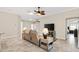 Living room with recliner, side table, and TV at 3962 Neighborly Way, The Villages, FL 32163