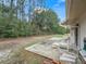 Private backyard with patio, offering a peaceful outdoor space at 39727 Redbud Rd, Lady Lake, FL 32159