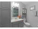 Clean bathroom with vanity, toilet and shower at 419 Cambio Ct, The Villages, FL 32159