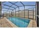 Refreshing, screened-in pool perfect for relaxation at 4637 Cragmere Loop, Clermont, FL 34711