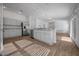 Kitchen area features stainless steel appliances, modern cabinets, and granite countertops at 4654 Ramsell Rd, The Villages, FL 32163